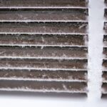 Close-up,Of,Dusty,Louvered,Air,White,Return,Air,Grille,Vent