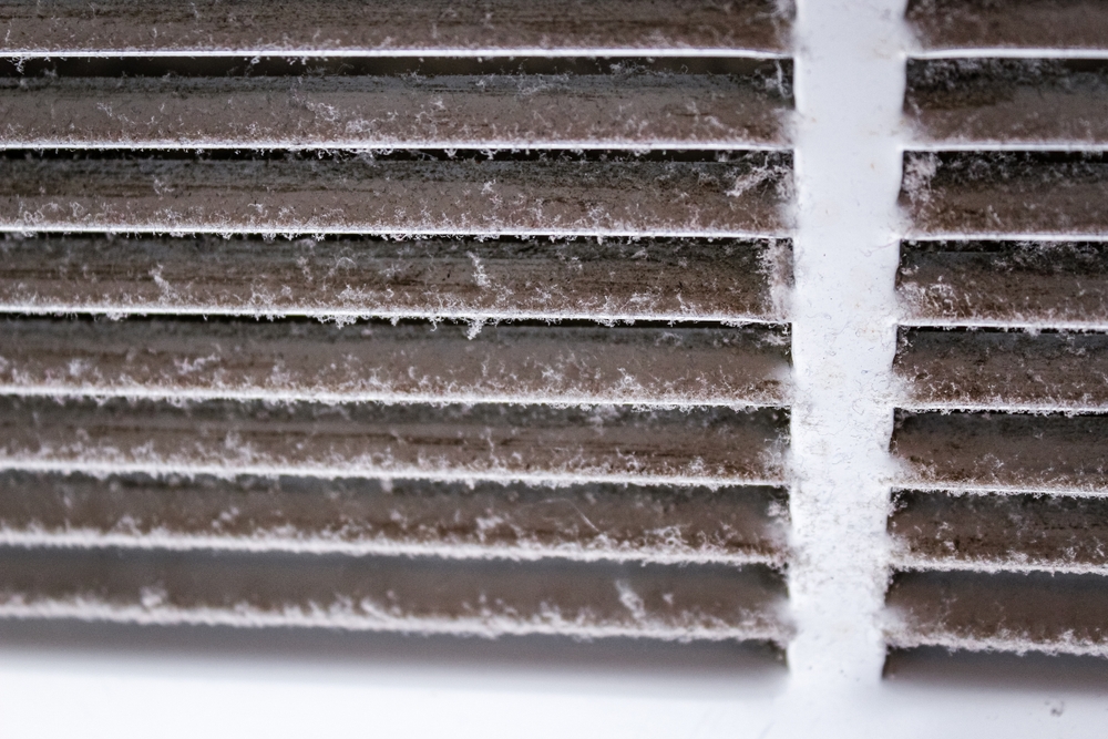 Close-up,Of,Dusty,Louvered,Air,White,Return,Air,Grille,Vent