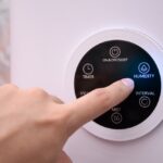 Close,Up,Man,Hand,Pressing,The,Digital,Humidifier,Button,On