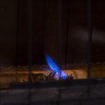Small,Pilot,Flame,For,Gas,Furnace,Heater.,Constant,Blue,Flame