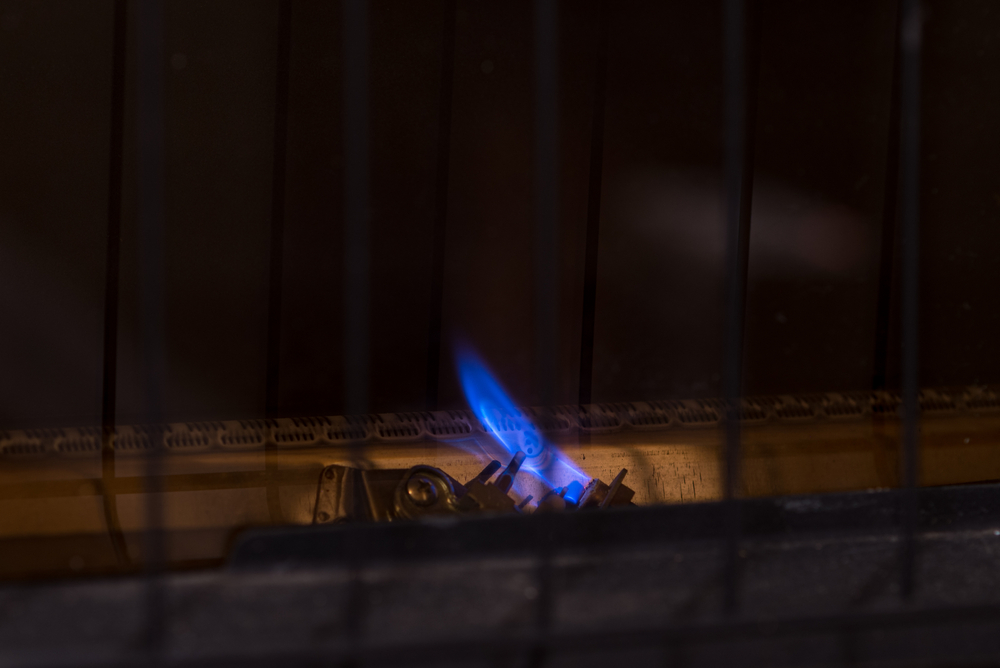 Small,Pilot,Flame,For,Gas,Furnace,Heater.,Constant,Blue,Flame